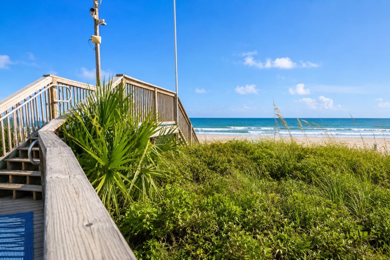 SeaWatch Resort beach access walkway leading to the ocean