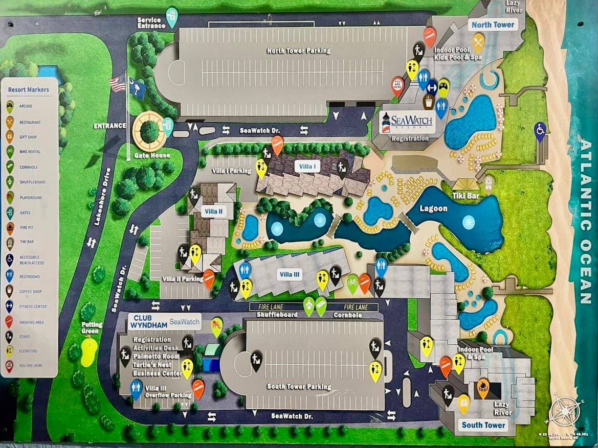 SeaWatch Resort map showing towers, parking, pools, restaurants, beach access, and amenity markers.