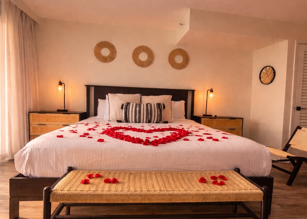 Rose petals arranged on bed for romantic Myrtle Beach getaway