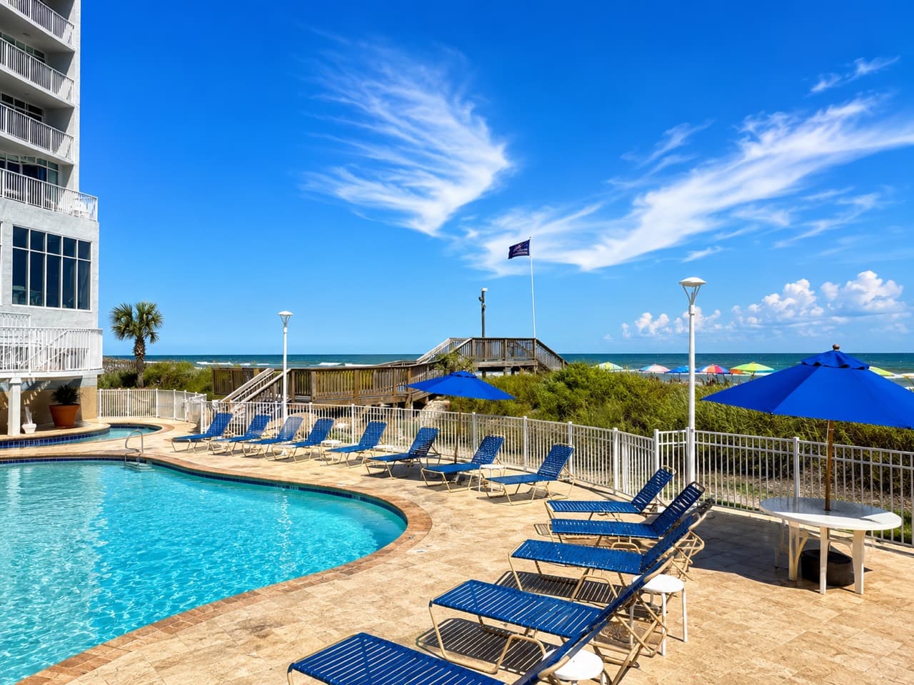 SeaWatch Resort oceanfront pool and lounge deck in daylight